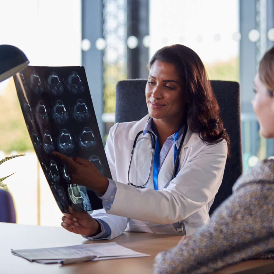 Female Doctor Discussing Scan Results With Woman Patient In Apollo Jbp Hospital