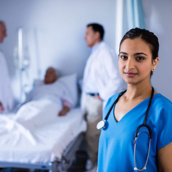 Portrait of female doctor smiling in the ward at hospital